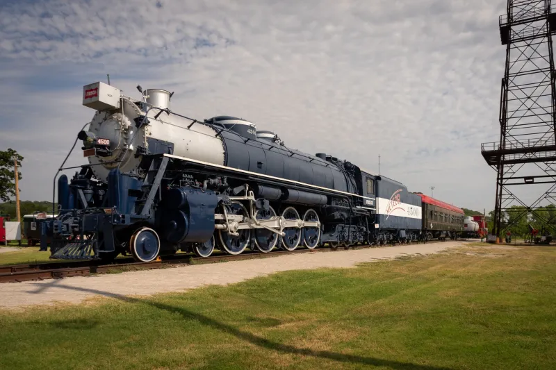 Iron Rails and Wandering Souls: Why Train Songs Have Always Been America's Portal Music